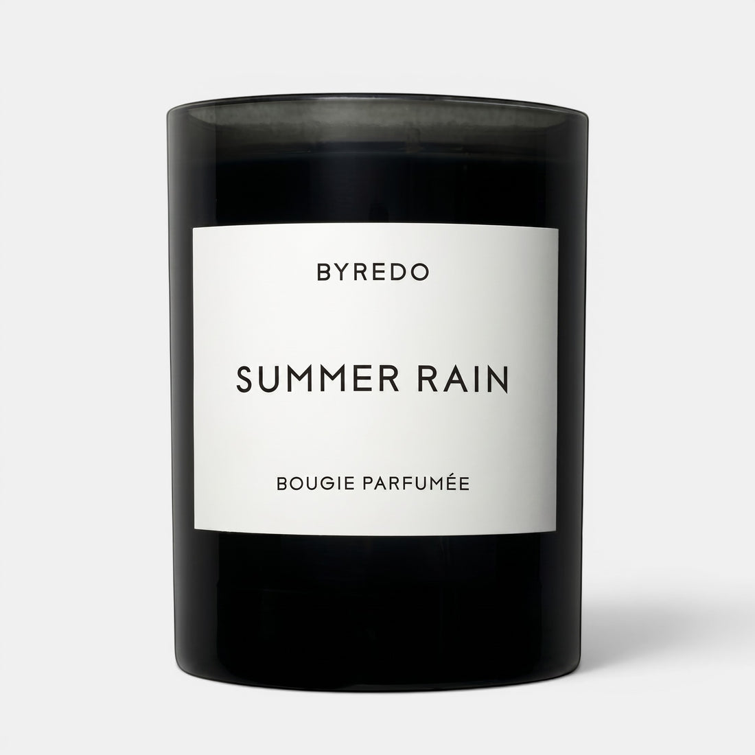 Shop Rescue Spa Byredo Summer Rain scented candle in a sleek black glass jar with a white minimalist label