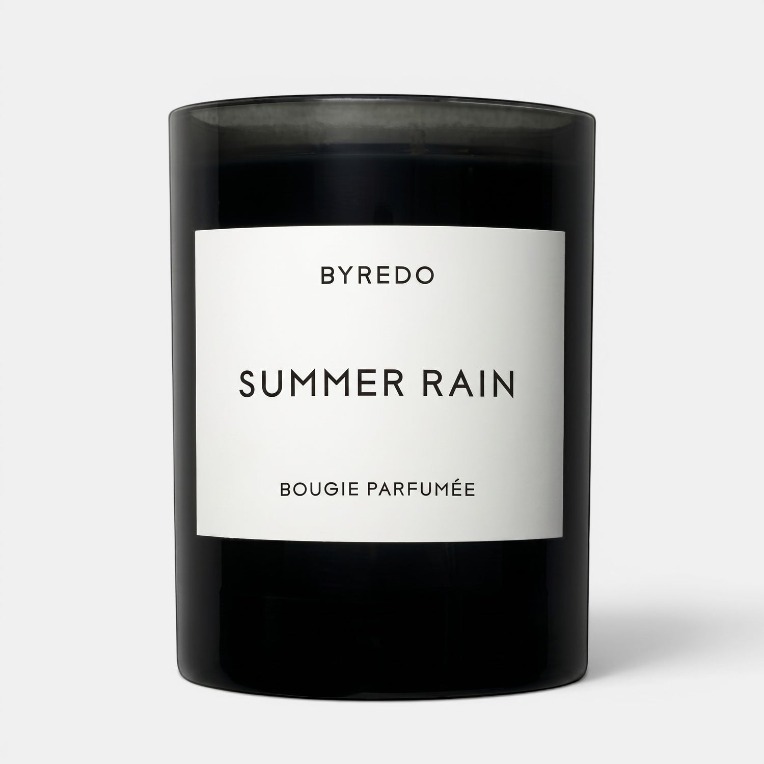 Shop Rescue Spa Byredo Summer Rain scented candle in a sleek black glass jar with a white minimalist label