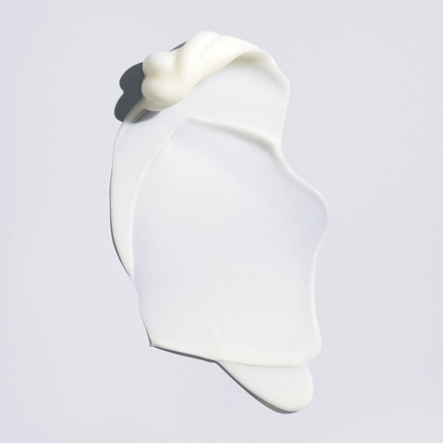 Shop Rescue Spa Supershine Light Moisturizing Cream swatch, a white creamy texture with a dollop on top.