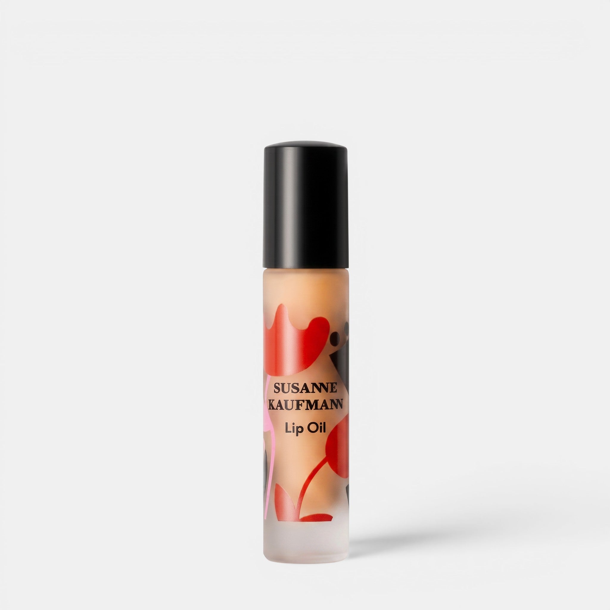 Shop Rescue Spa Susanne Kaufmann lip oil in a clear glass rollerball bottle with red floral pattern design