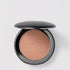 Shop Rescue Spa Super Loaded Tinted Highlight in a shimmering bronze cream formula inside a sleek black compact.
