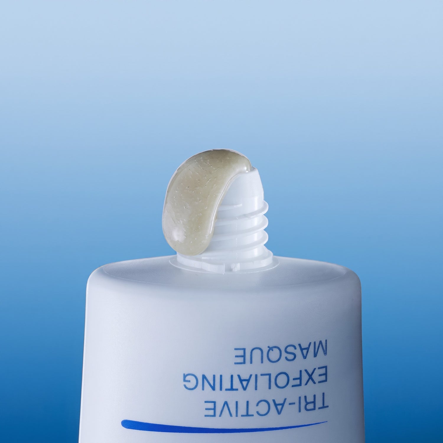 Shop Rescue Spa Tri-Active Exfoliating Masque with a dollop of translucent exfoliating gel on the tube nozzle