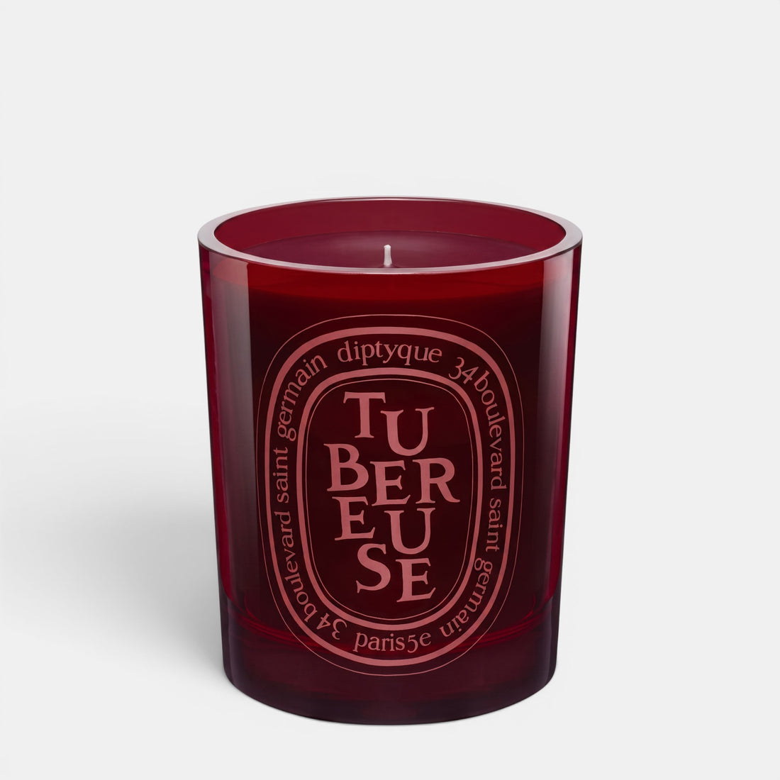 Shop Rescue Spa Tubereuse scented candle in a deep red glass vessel with signature oval label