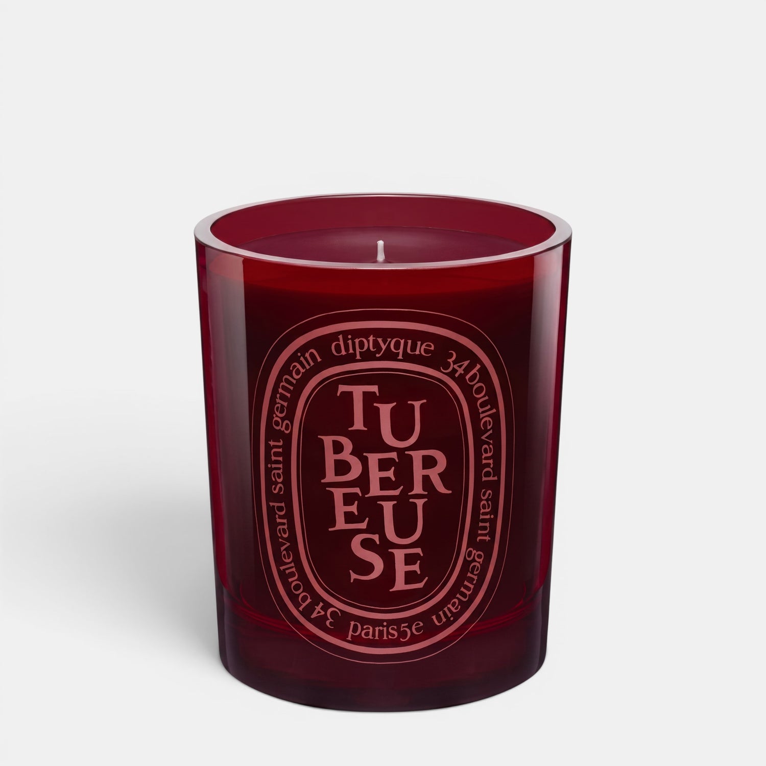 Shop Rescue Spa Tubereuse scented candle in a deep red glass vessel with signature oval label