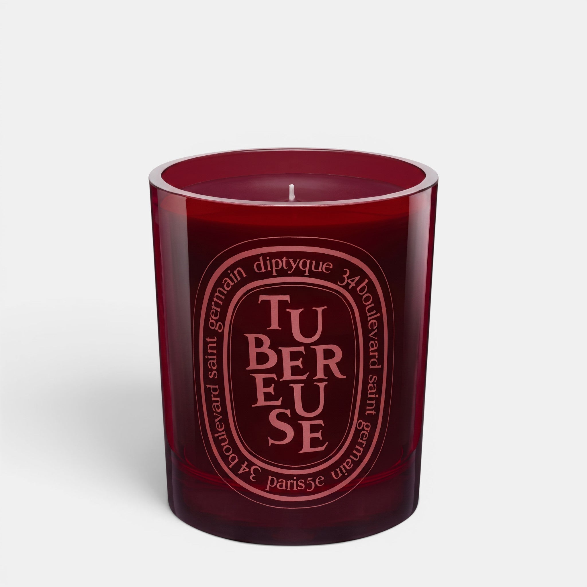 Shop Rescue Spa Tubereuse scented candle in a deep red glass vessel with signature oval label