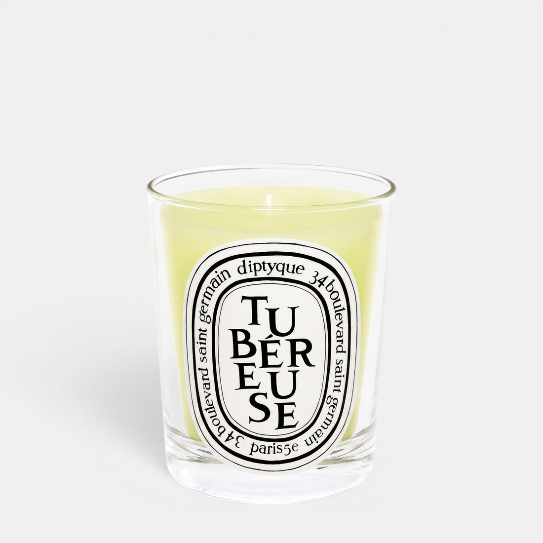 Shop Rescue Spa Tubereuse scented candle in a clear glass jar with a white oval label and pale yellow wax