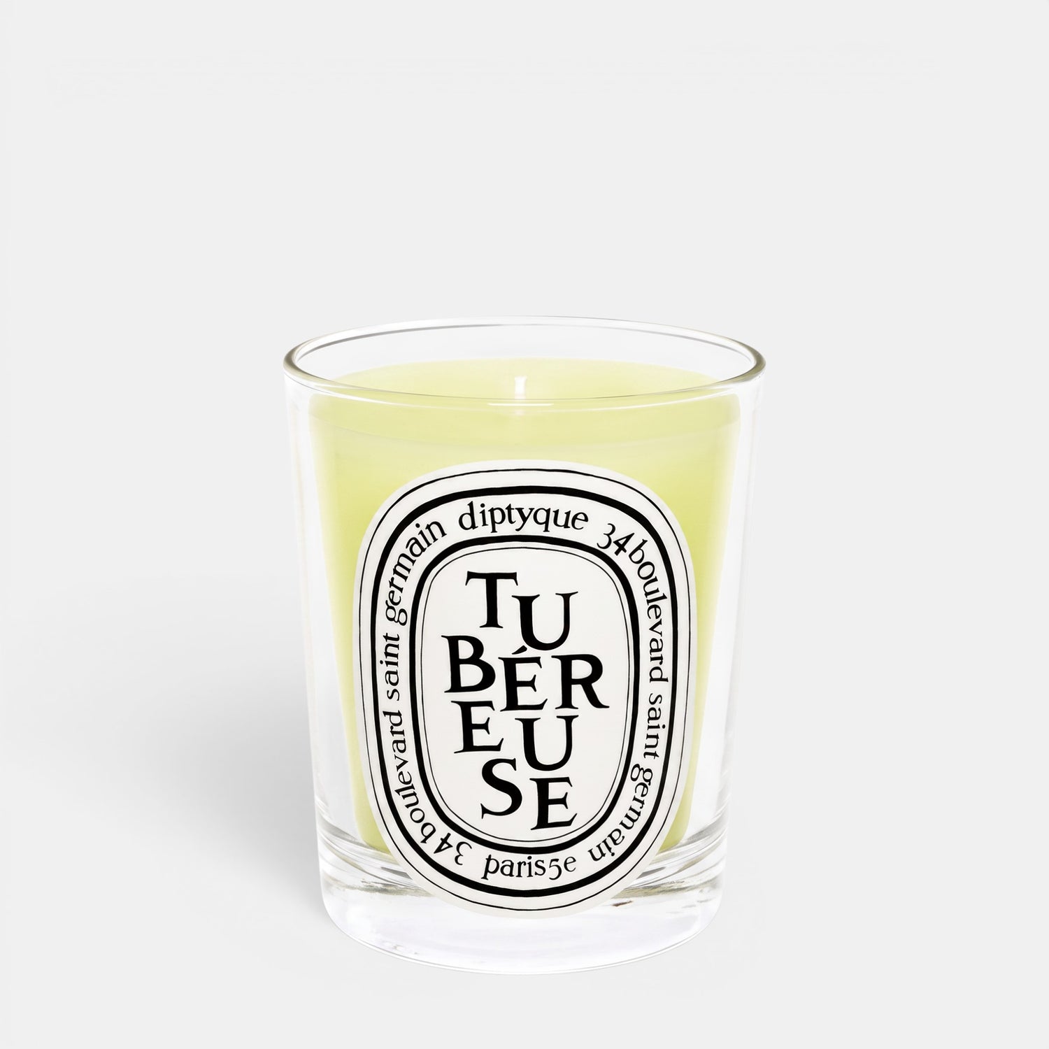 Shop Rescue Spa Tubereuse scented candle in a clear glass jar with a white oval label and pale yellow wax