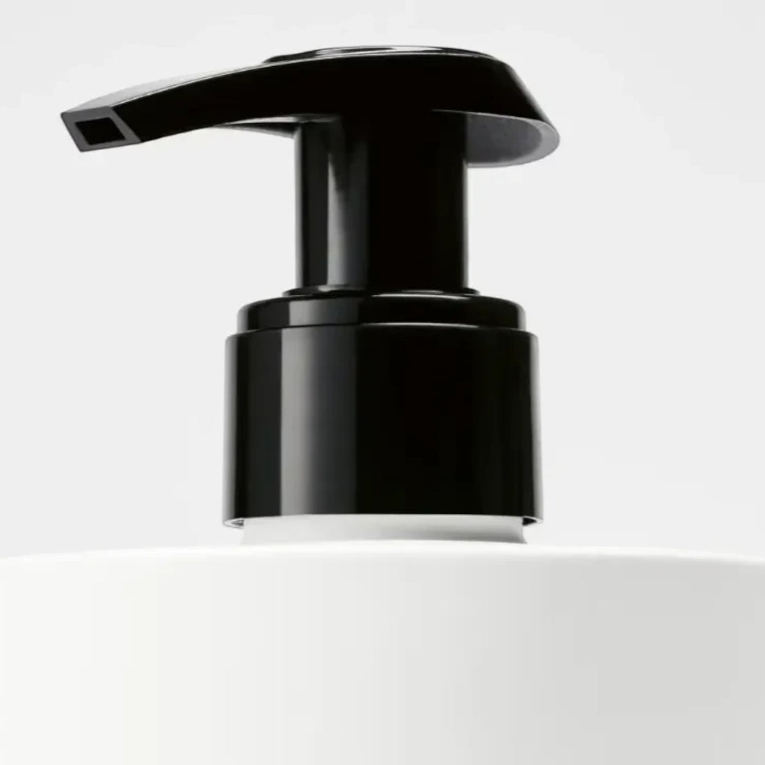 Shop Rescue Spa Tulipmania Hand Lotion with black pump dispenser and white bottle. Notes of freesia, tulip, and blonde woods.