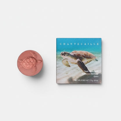 Shop Rescue Spa Turtle Grace refill pan blush in deep apricot with embossed turtle design. Smooth powder.