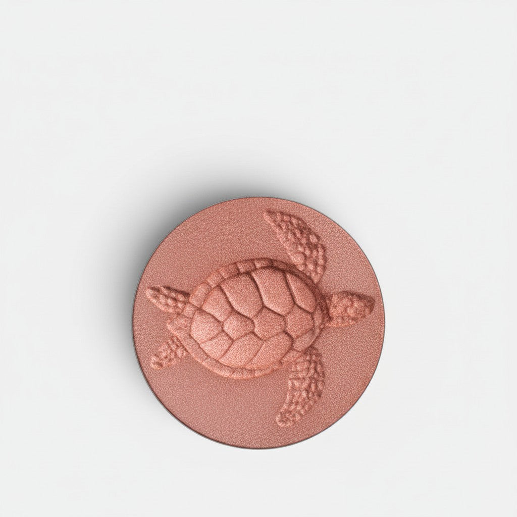Shop Rescue Spa Turtle Grace refill pan blush in deep apricot with embossed turtle design. Finely milled powder.