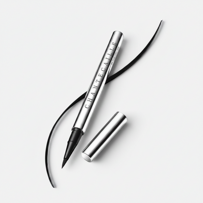 Shop Rescue Spa Le Stylo Ultra Slim black liquid eyeliner pen with a precise calligraphy tip and silver casing.