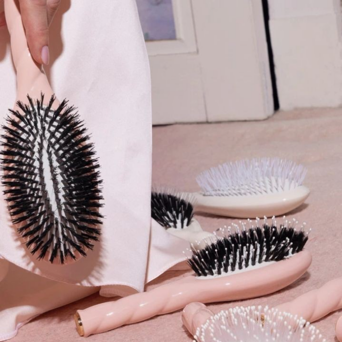 Shop Rescue Spa N.01 large universal hair brushes in coral and ivory with boar bristles for detangling and shine