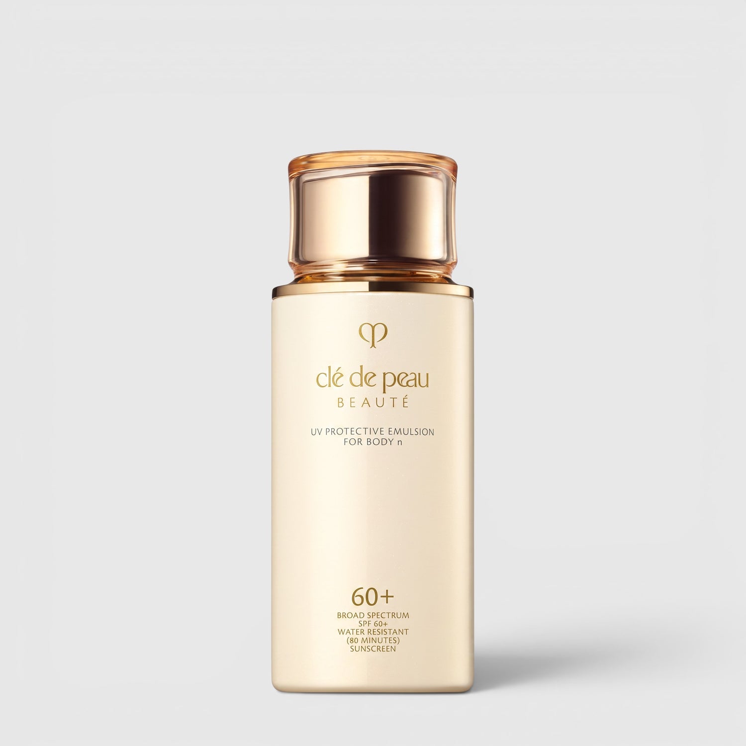 Shop Rescue Spa UV Protective Emulsion SPF 60+ body sunscreen in a beige bottle with a gold cap.