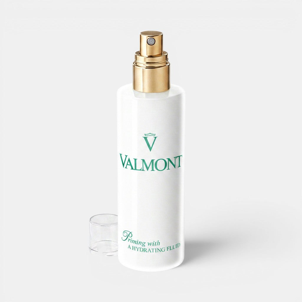 Shop Rescue Spa Valmont Priming with a Hydrating Fluid facial mist in a white bottle with a gold spray nozzle
