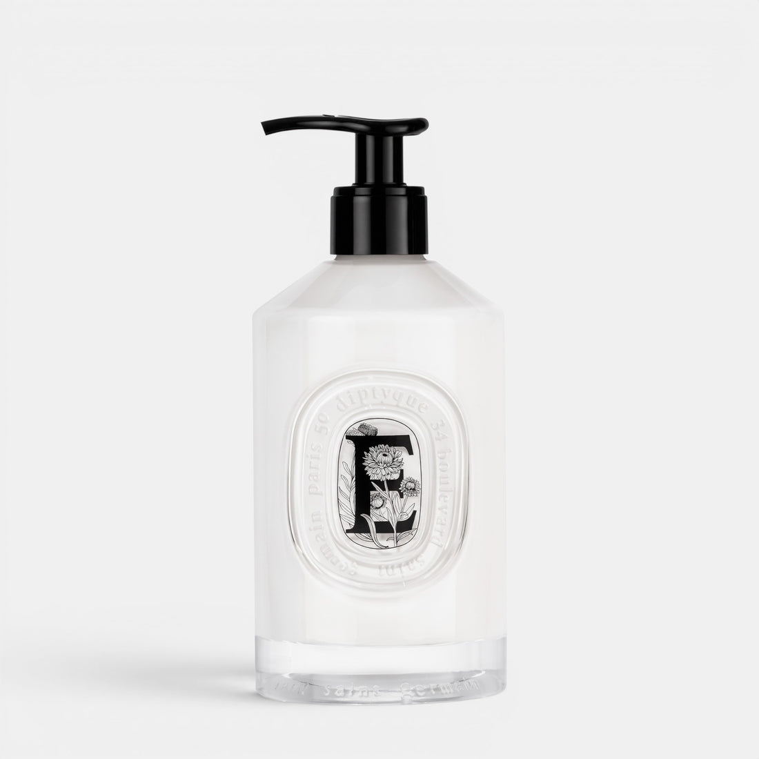 Shop Rescue Spa Velvet Hand Lotion in a clear 350ml bottle with a black pump dispenser and decorative floral label
