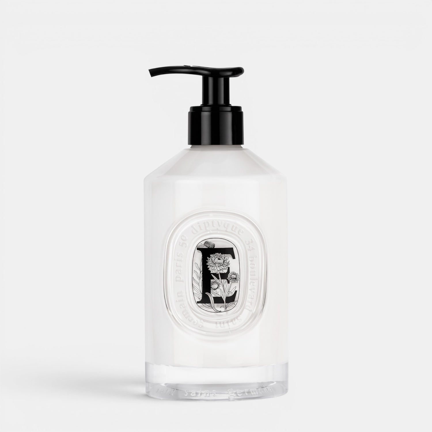 Shop Rescue Spa Velvet Hand Lotion in a clear 350ml bottle with a black pump dispenser and decorative floral label