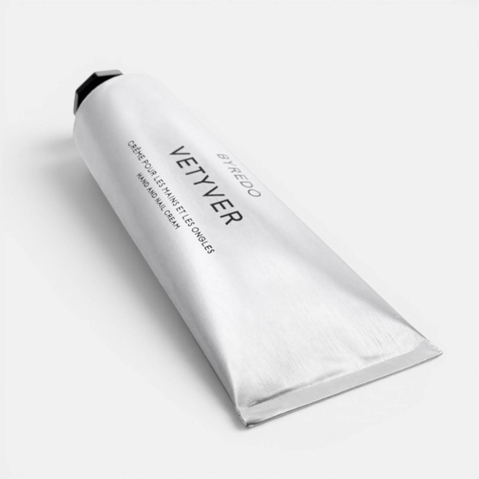 Shop Rescue Spa Vetyver Hand &amp; Nail Cream in a sleek silver metal tube for daily moisturizing and woody fragrance.