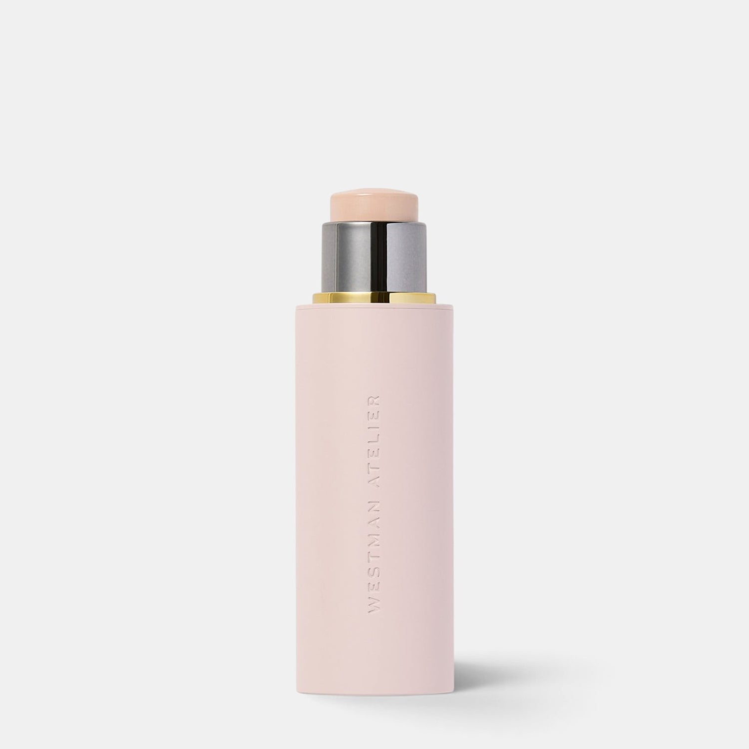Shop Rescue Spa Westman Atelier Vital Skin Foundation Stick in a sleek pale pink cylindrical tube with gold accents.