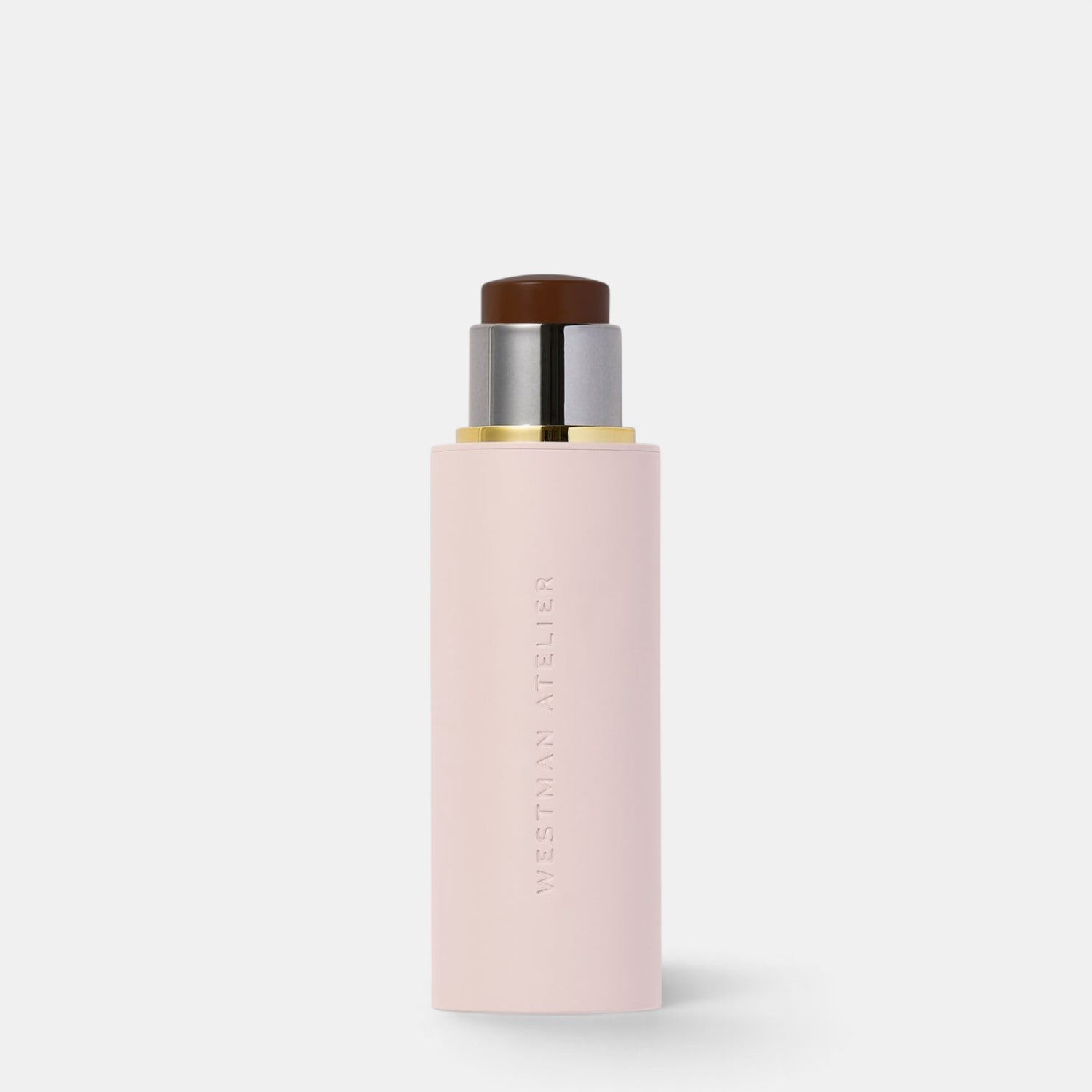 Shop Rescue Spa Westman Atelier Vital Skin Foundation Stick in a pale pink tube with a dark cream base.