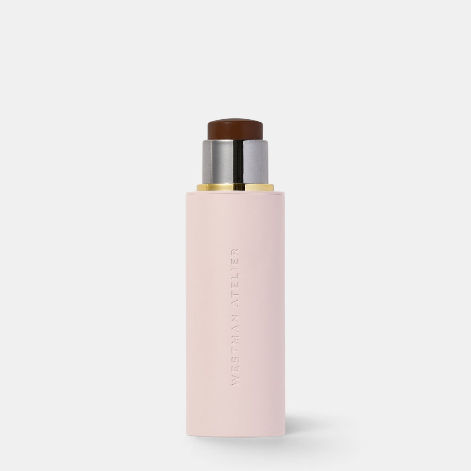 Shop Rescue Spa Westman Atelier Vital Skin Foundation Stick in a pale pink tube with a dark cream base.