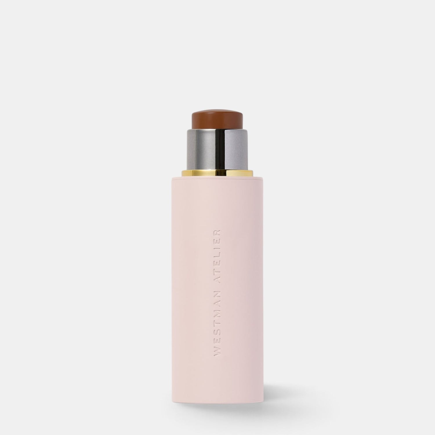Shop Rescue Spa Westman Atelier Vital Skin Foundation Stick in a pale pink twist-up tube with a dark cream base.