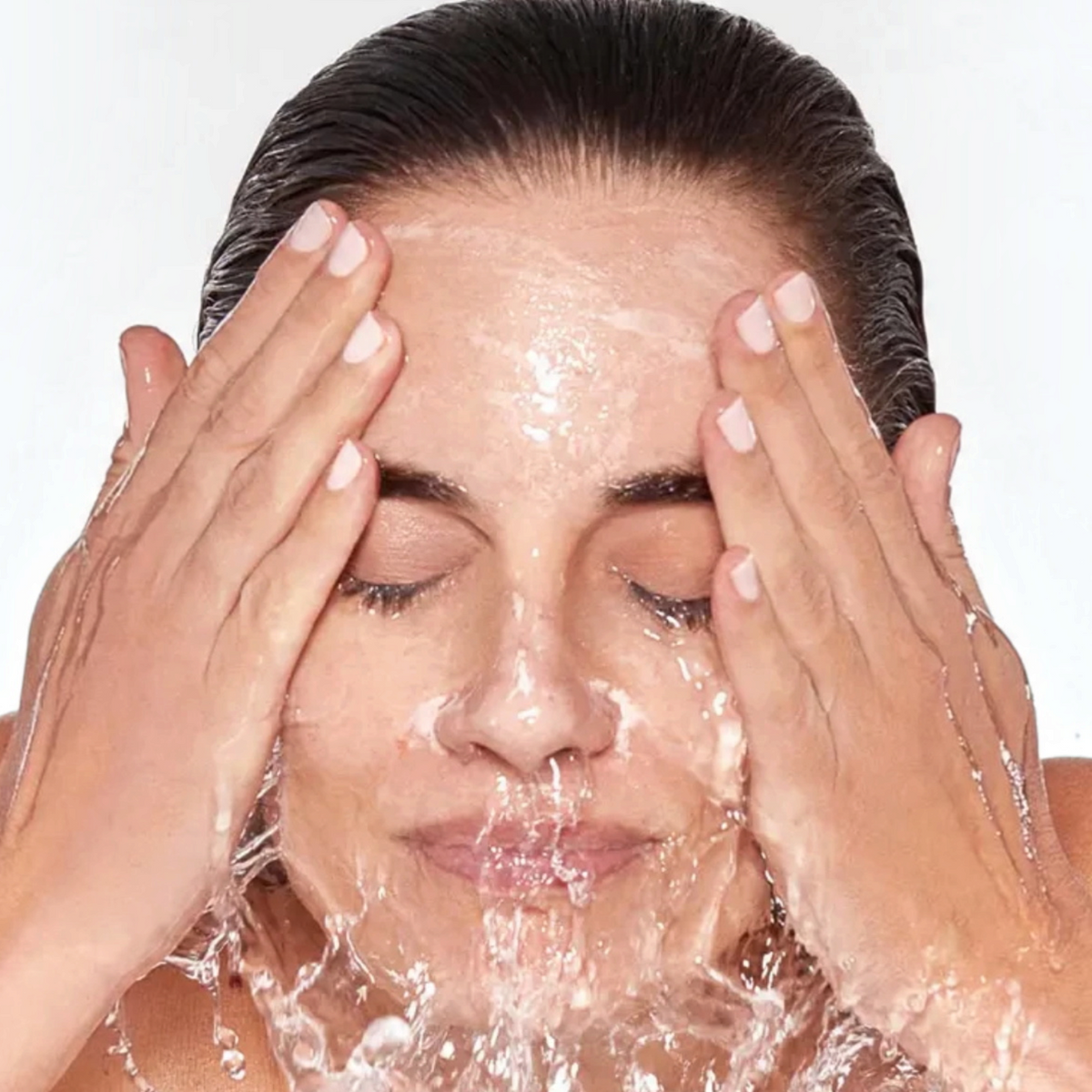 Shop Rescue Spa Black Diamond Vitamin C Brightening Cleanser being applied to a woman&