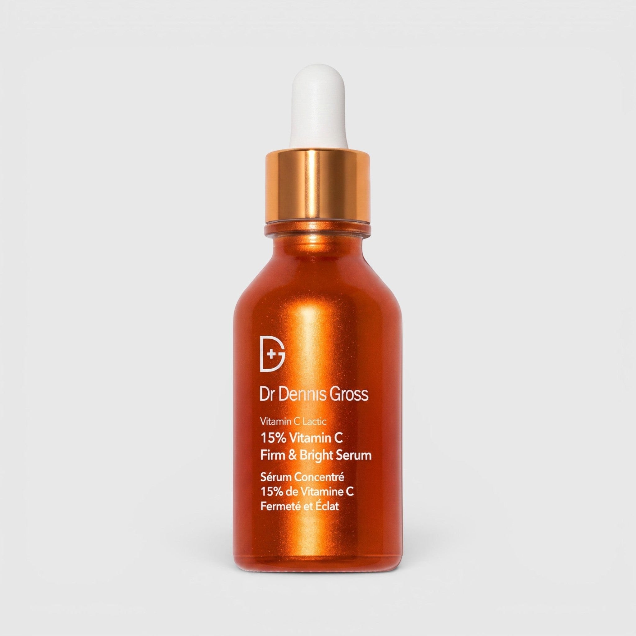 Shop Rescue Spa Dr Dennis Gross Vitamin C Lactic 15% Firm &amp; Bright Serum in an orange glass dropper bottle.