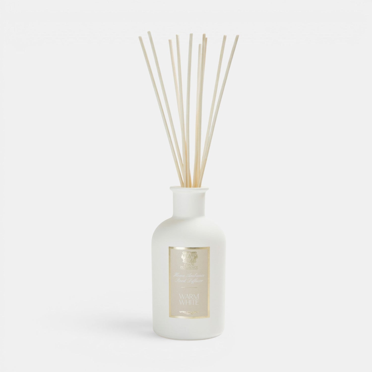 Shop Rescue Spa Warm White reed diffuser in a matte white glass bottle with natural rattan reeds.