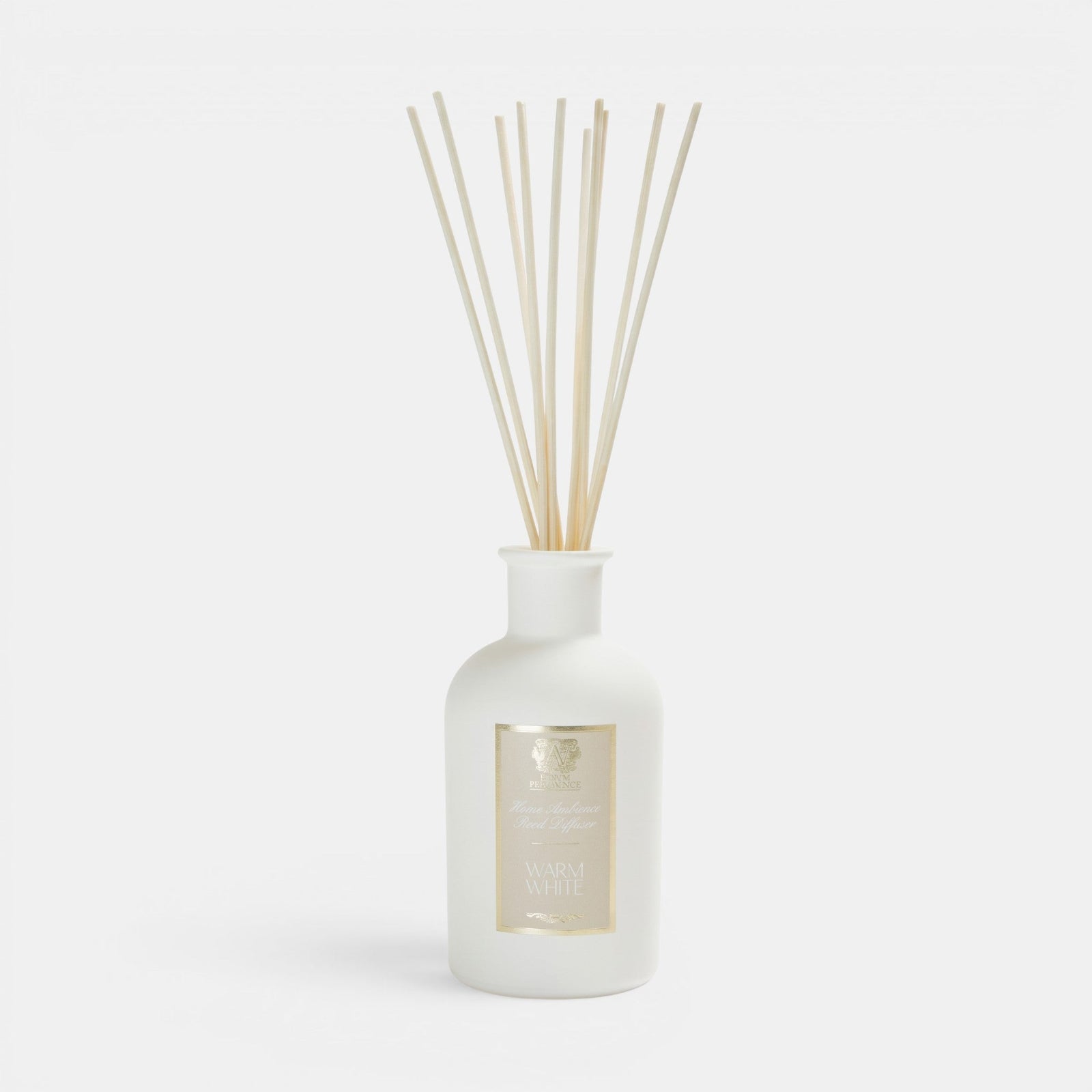 Shop Rescue Spa Warm White reed diffuser in a matte white glass bottle with natural rattan reeds.