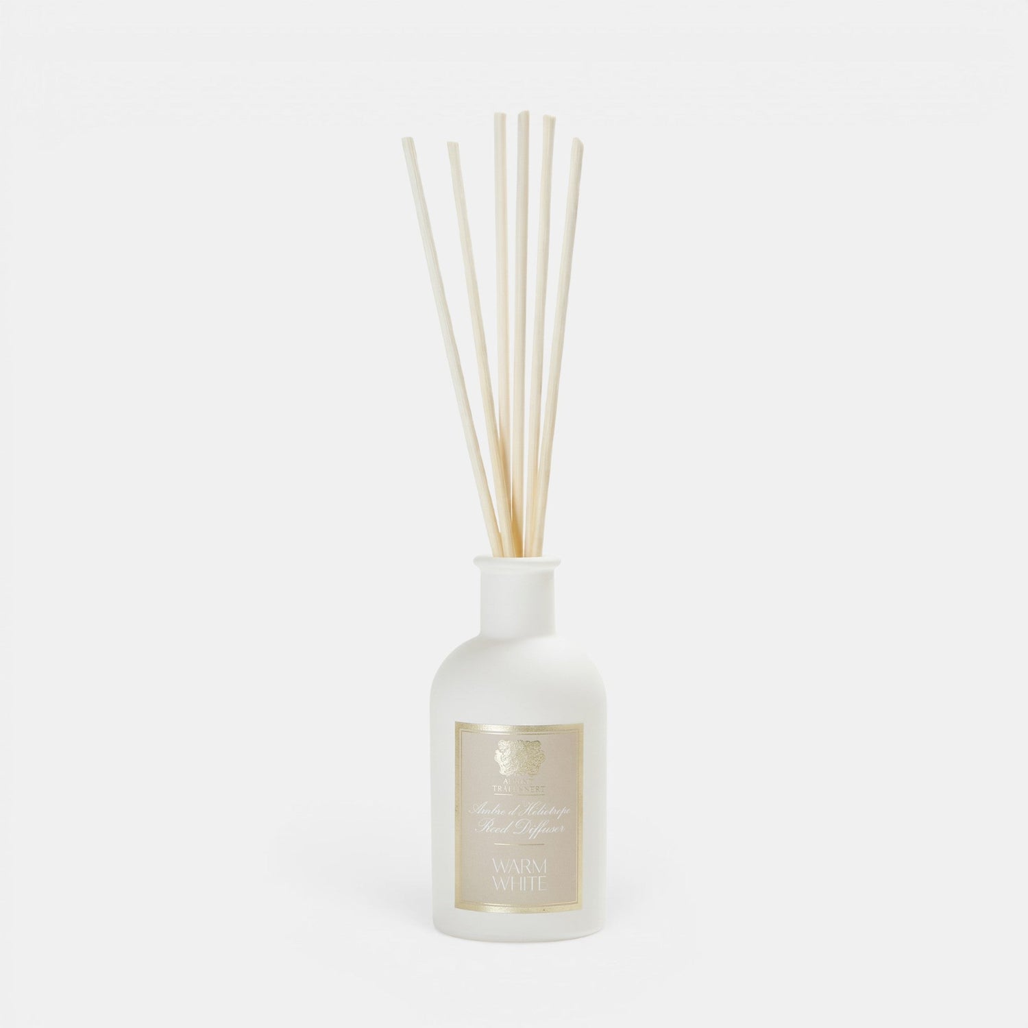 Shop Rescue Spa Warm White reed diffuser in a frosted white glass bottle with natural rattan reeds.