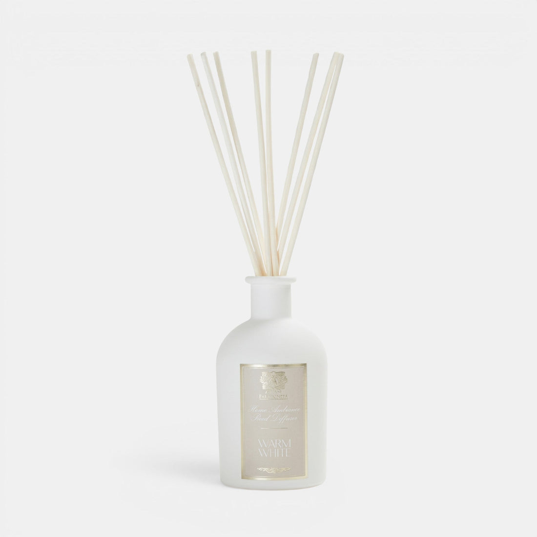 Shop Rescue Spa Warm White reed diffuser in a matte white glass bottle with natural wooden reeds