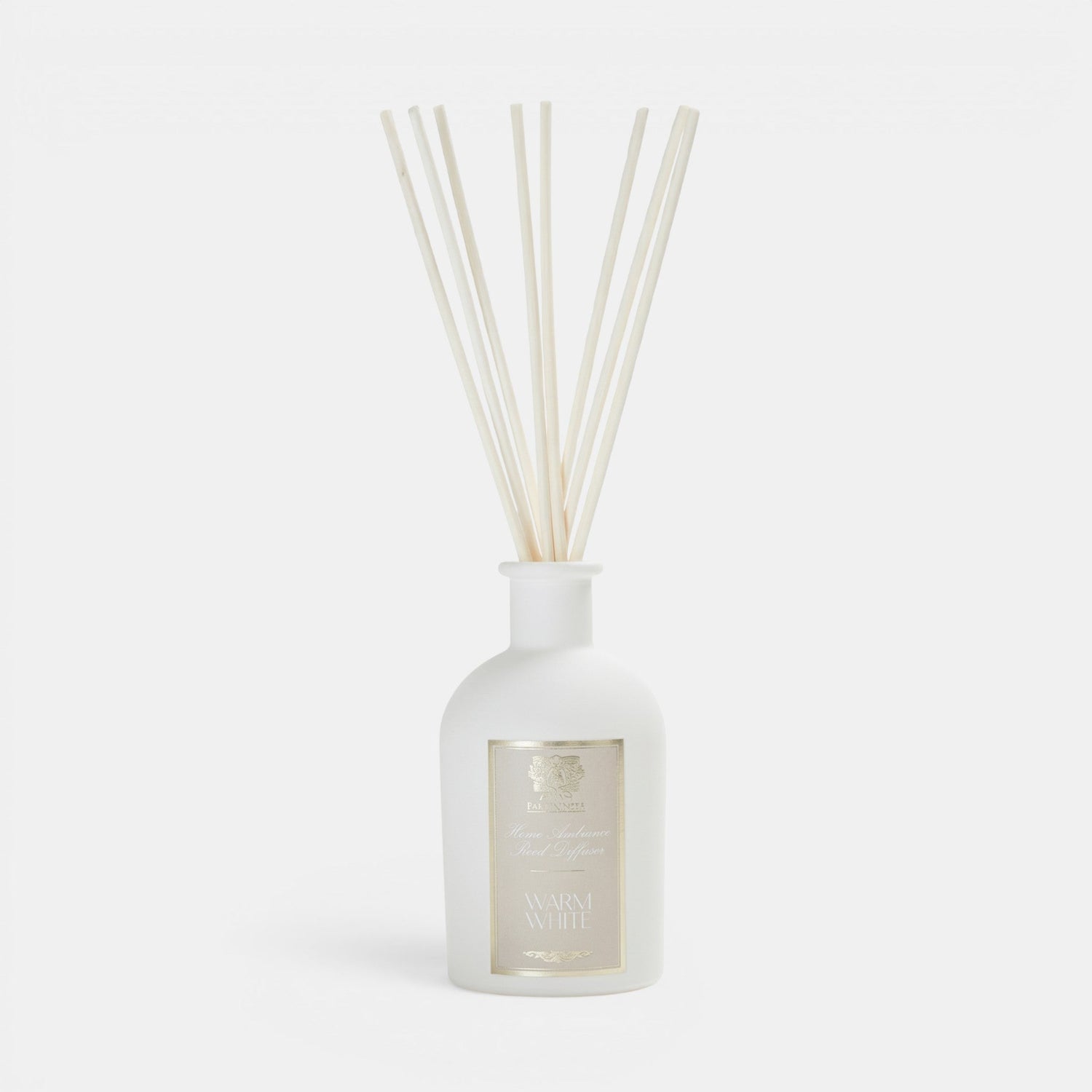 Shop Rescue Spa Warm White reed diffuser in a matte white glass bottle with natural wooden reeds