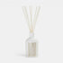 Shop Rescue Spa Warm White reed diffuser in a matte white glass bottle with natural wooden reeds