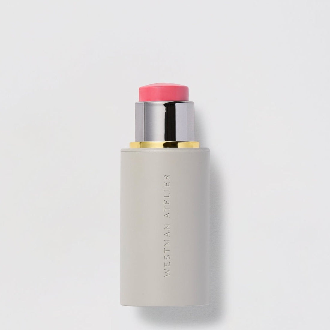 Shop Rescue Spa Westman Atelier Baby Cheeks Blush Stick in a creamy pink shade with a sleek grey twist-up tube
