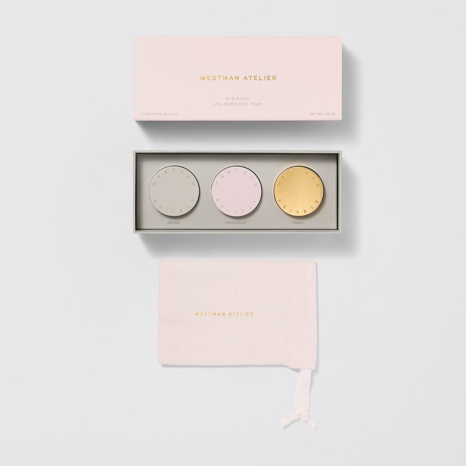 Shop Rescue Spa Westman Atelier Eye Pods Les Jours trio with magnetic cream-powder eyeshadow pods and pink pouch.