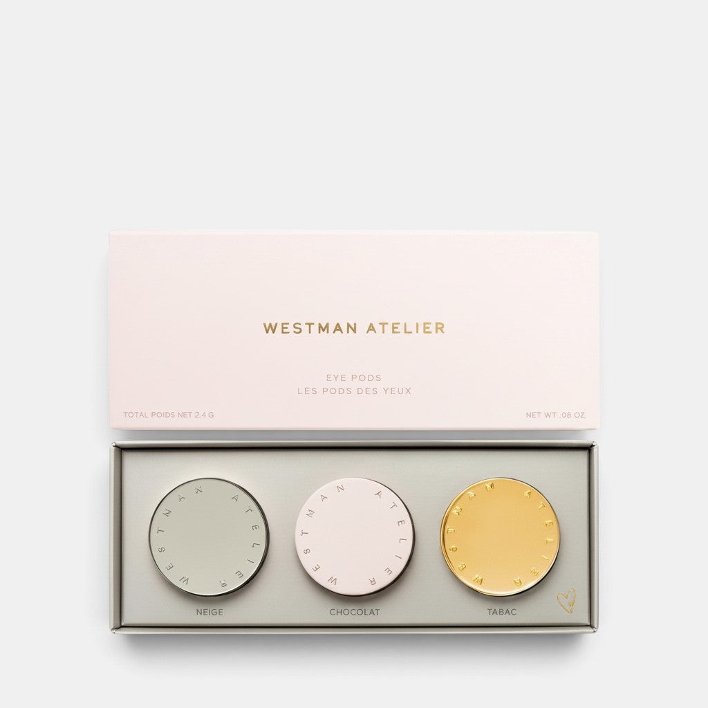 Shop Rescue Spa Westman Atelier Eye Pods Les Jours trio featuring magnetic cream-powder eyeshadow pods in Neige, Chocolat, and Tabac shades.