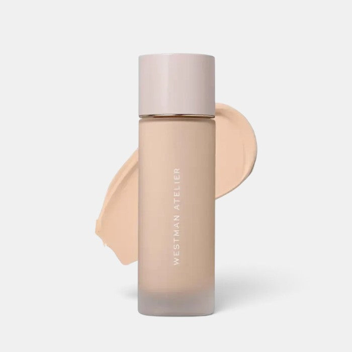 Shop Rescue Spa Westman Atelier Supreme Bio-Complex liquid foundation in a frosted glass bottle with a beige cap.