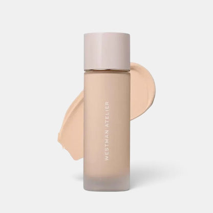 Shop Rescue Spa Westman Atelier Supreme Bio-Complex liquid foundation in a frosted glass bottle with a beige cap.