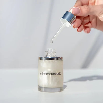 Shop Rescue Spa Glacial White Caviar Hydra-Pure Precious Elixir in a glass bottle with a silver dropper applicator