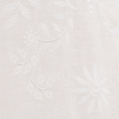 Shop Rescue Spa white linen fabric featuring delicate floral embroidery and artisanal hand-finished details.