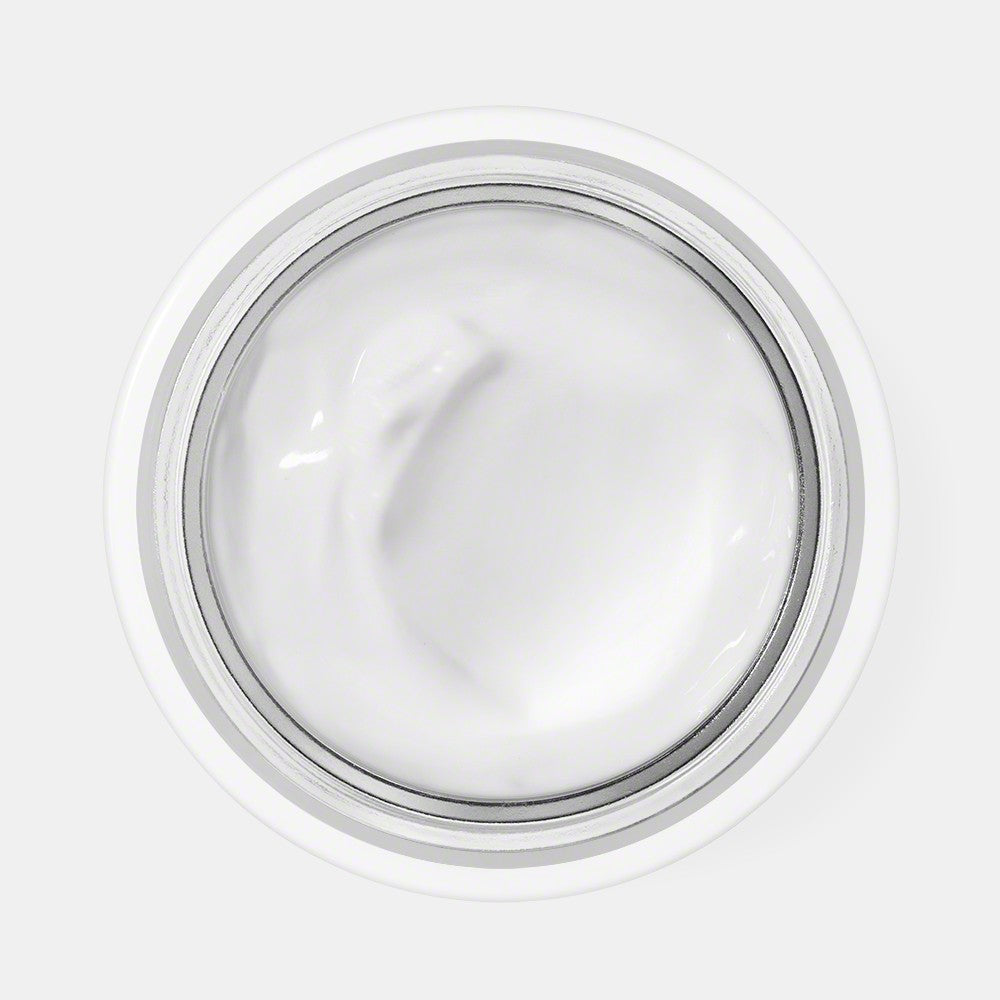 Open jar of Valmont Prime Renewing Pack displaying visible cream inside on a white background.