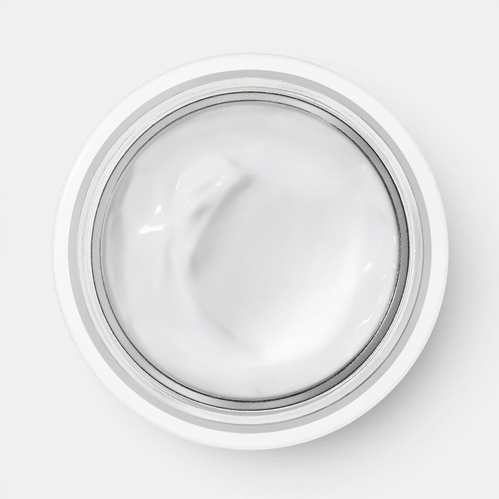 Open jar of Valmont Prime Renewing Pack displaying visible cream inside on a white background.