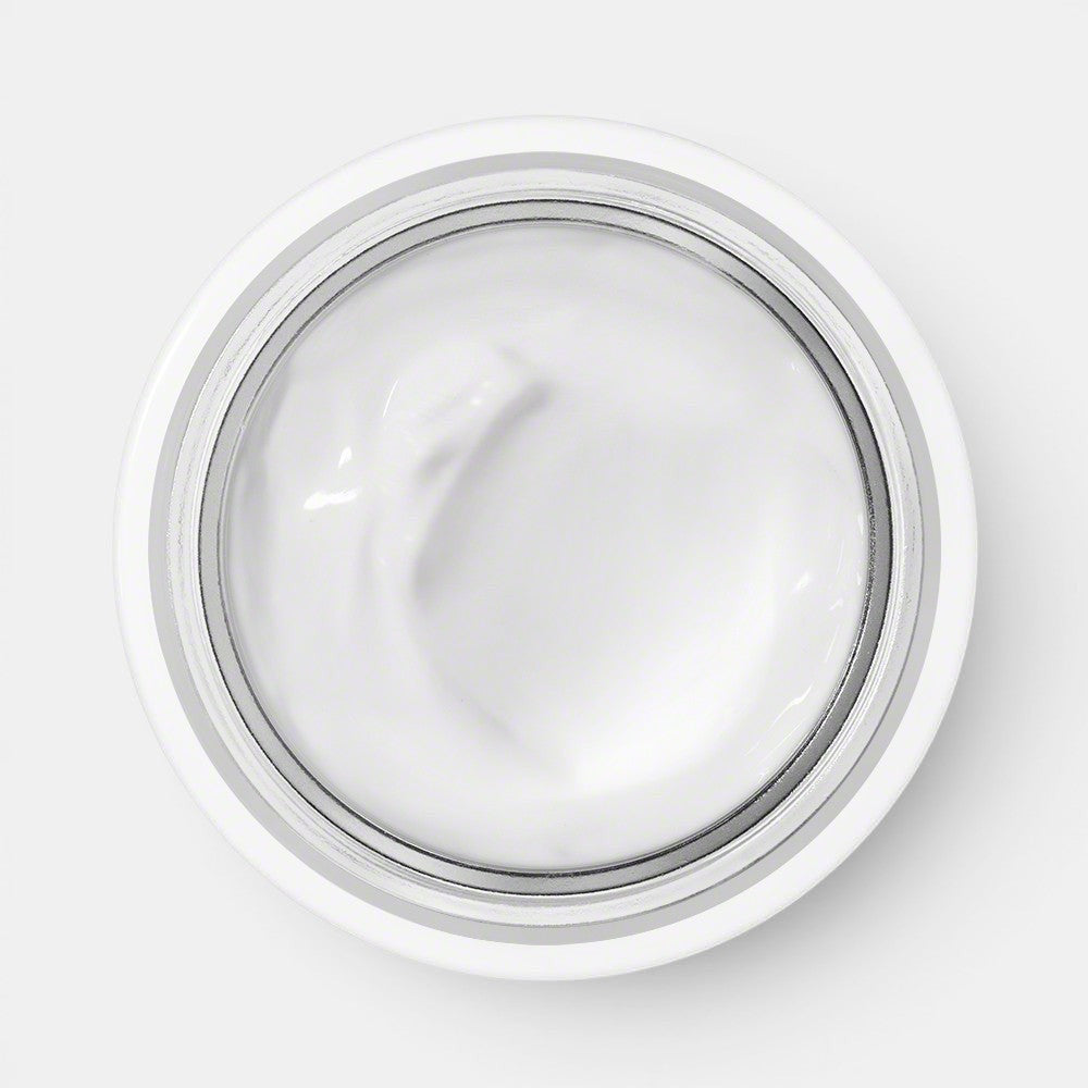 Open jar of Valmont Prime Renewing Pack displaying visible cream inside on a white background.