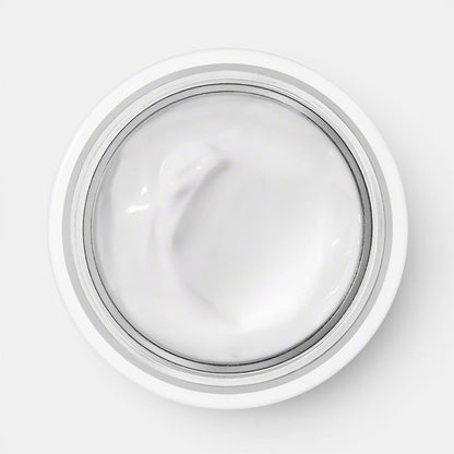 Open jar of Valmont Prime Renewing Pack displaying visible cream inside on a white background.