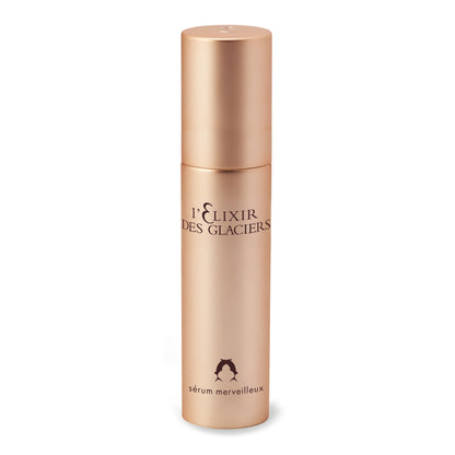 Valmont Serum Merveilleux positioned upright with a white background in a golden bottle. A serum that remineralizes, boosts radiance, smooths and firms.