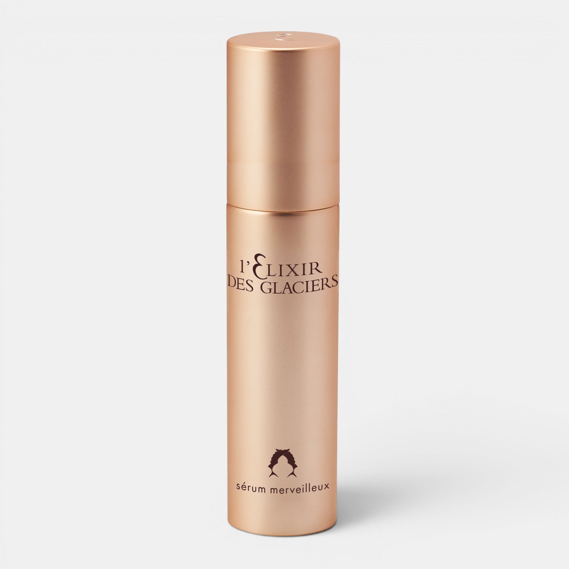 Valmont Serum Merveilleux positioned upright with a white background in a golden bottle. A serum that remineralizes, boosts radiance, smooths and firms.