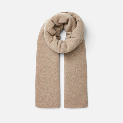 Shop Rescue Spa beige cashmere travel wrap, a soft and versatile unisex knit scarf or lightweight blanket.