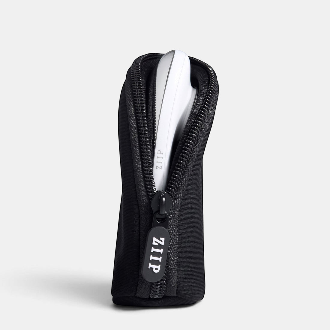 ZIIP travel bag in ultra-black neoprene with a custom ZIIP zipper pull, holding a ZIIP device.